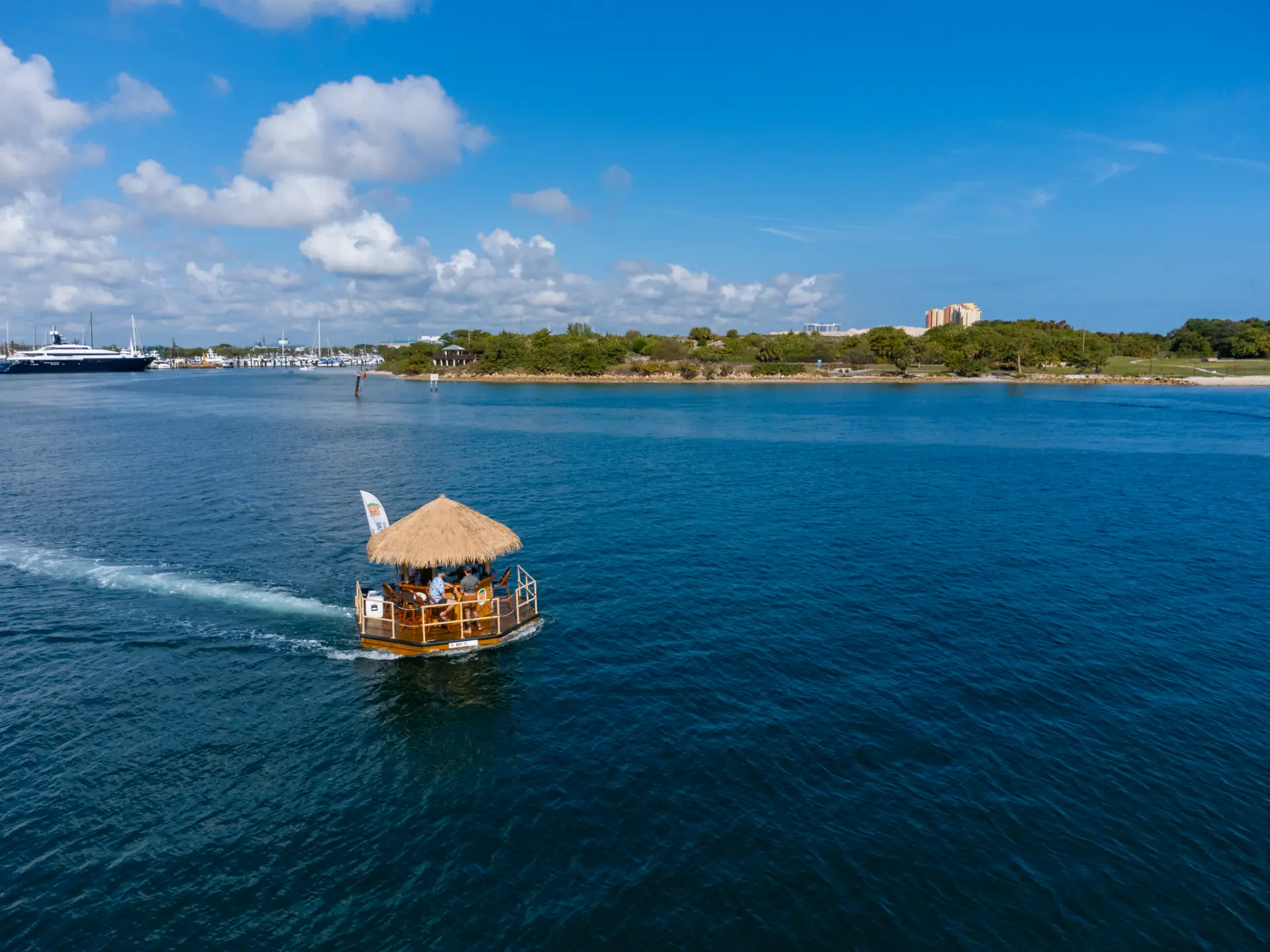 Aerial view of a tiki boat cruising on open water